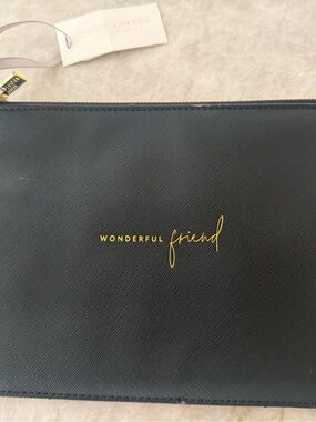 Black 'Wonderful Friend' Wristlet Clutch by Kate Loxton